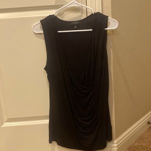 Black sleeveless mock wrap top